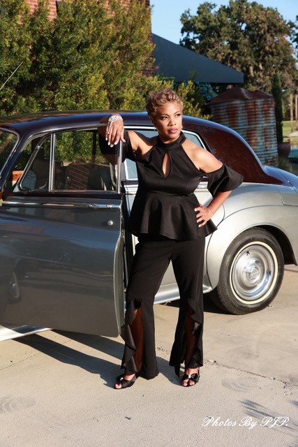 birthday girl in front of luxury car